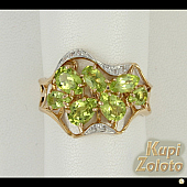 Золотой комплект  Перстень с хризолитами и фианитами в сочетании с изделием Золотое кольцо с хризолитами и фианитами Фото