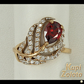 Серебряный комплект  Перстень в сочетании с изделием Серьги из серебра с красным фианитом Фото