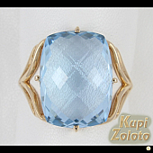Золотой комплект  Перстень с крупным топазом в сочетании с изделием Серьги с крупным голубым топазом Фото