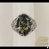Серебряный комплект Перстень  с зеленым янтарем в сочетании с изделием Перстень из серебра с зеленым янтарем Фото